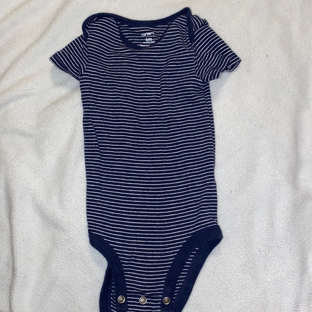 Navy blue striped onesie.